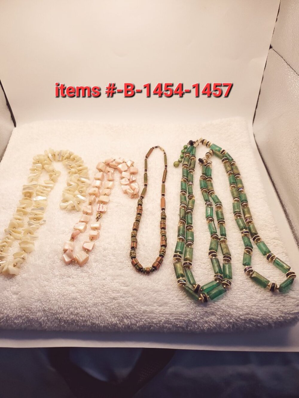 4 Necklaces, items # B- 1454-1457,.  wt. 200 grams.